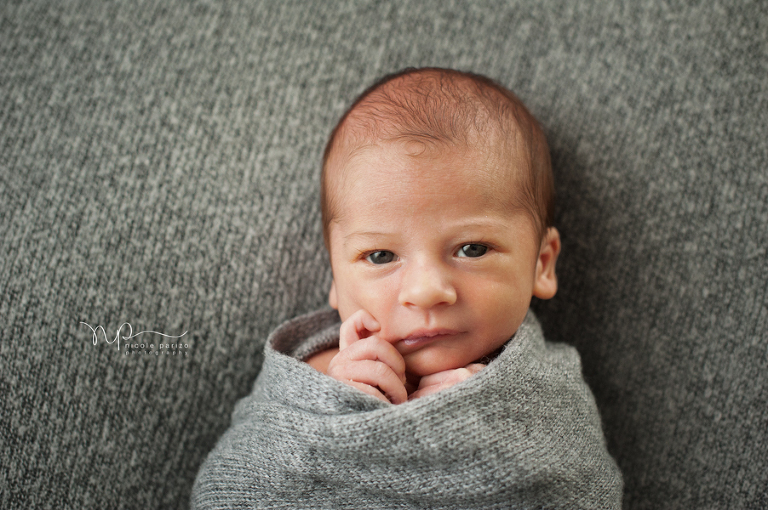 Nicole Parizo Photography | Chicago Newborn Photographer | wide eyed baby boy